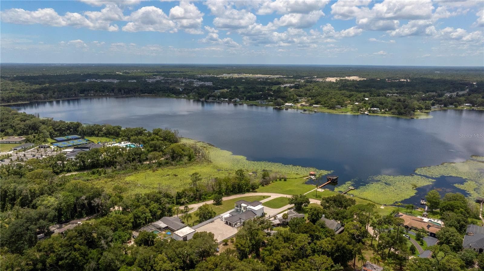 Aerial view of the estate grounds and its frontage on Lake Winnemissett