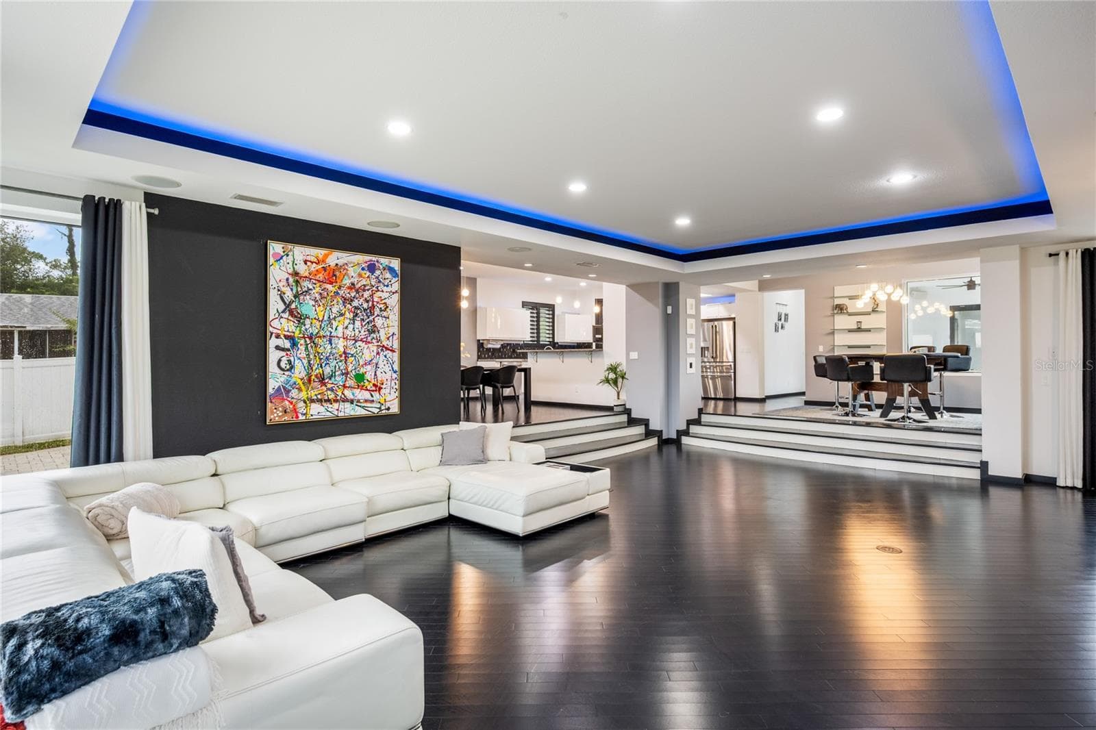 Living room with lake views and integrated whole-house audio