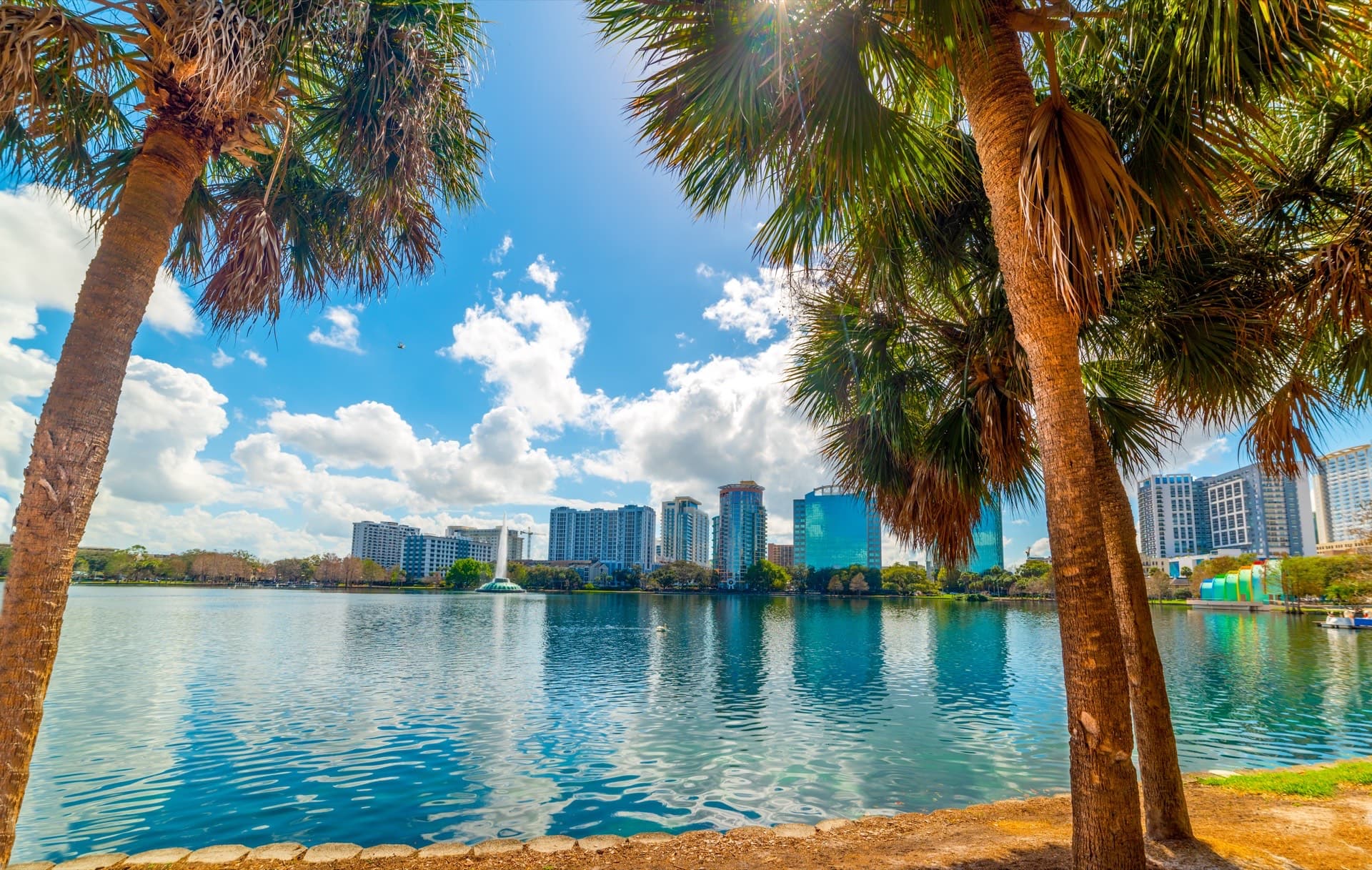 Orlando skyline reflected over Lake Eola at sunset