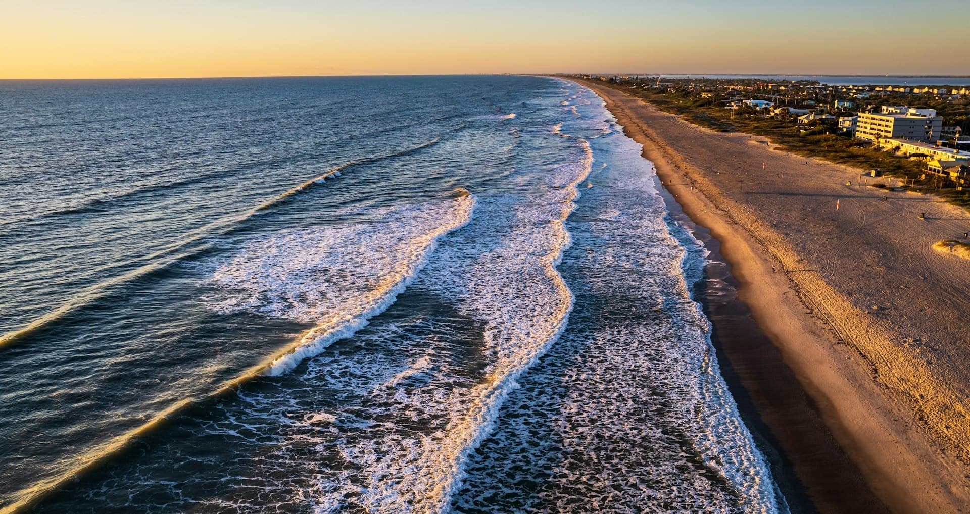 Aerial view of the Space Coast shoreline at sunset