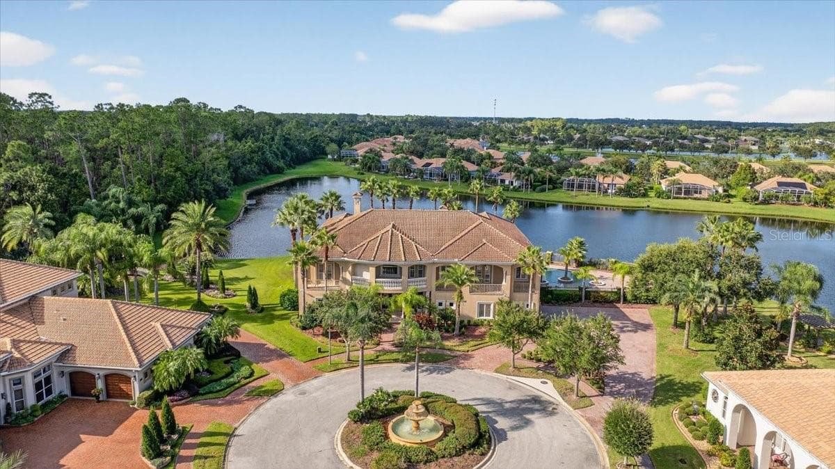 Venetian Bay streetscape with Mediterranean-style homes and landscaping in New Smyrna Beach
