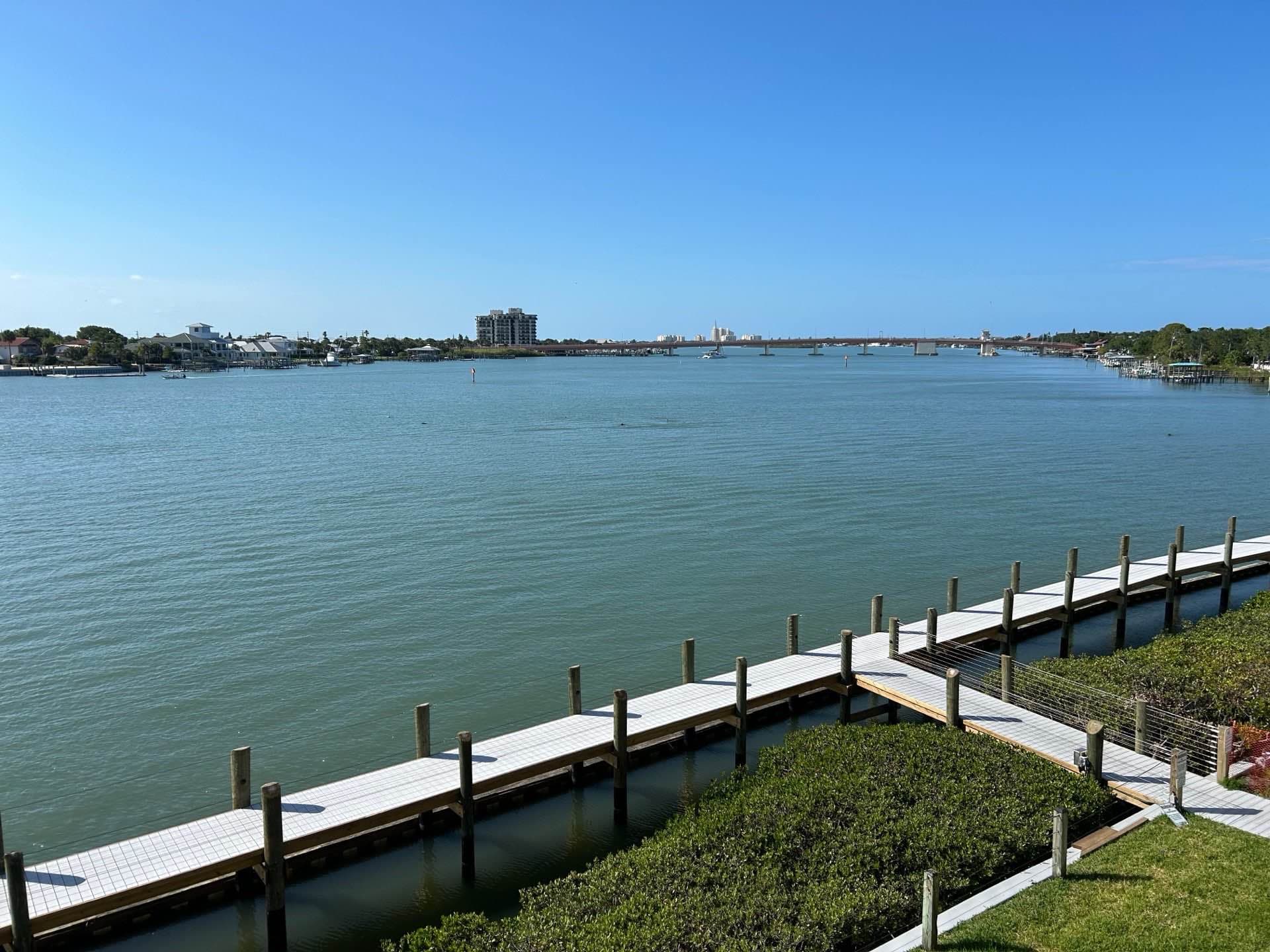Intracoastal Waterway view in New Smyrna Beach with waterfront homes and docks