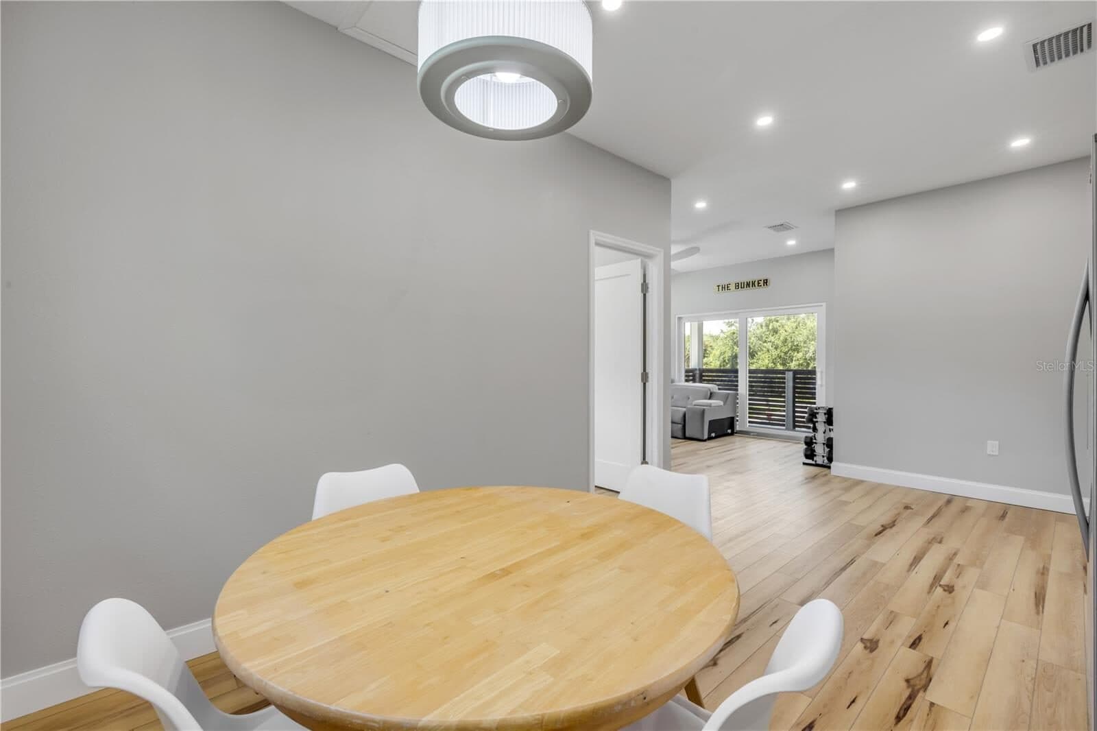 The guest apartment dining area, looking through to the living room